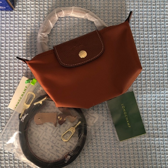 Longchamp Handbags - Longchamp Tan Crossbody Bag with Gold Details